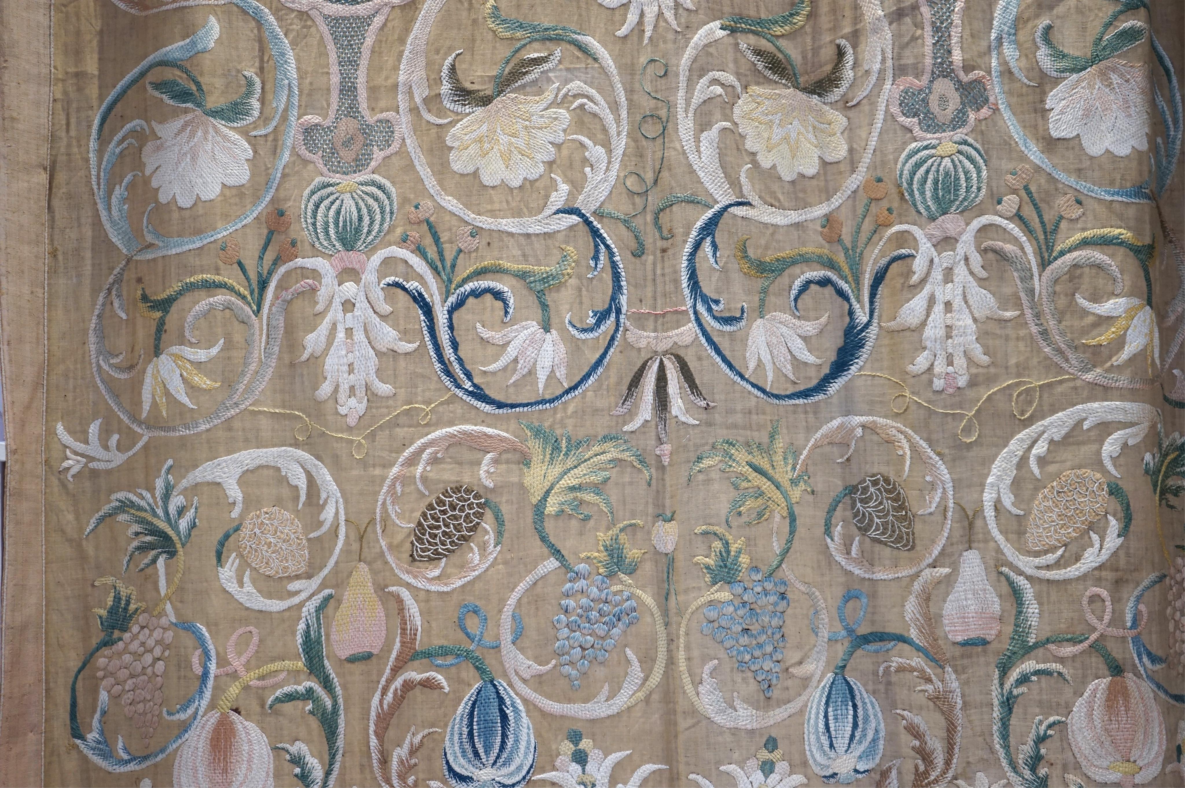 A large pair and one smaller panel of late 18th century Italian silk floss hand embroidered panels, possibly from Florence or Venice, both known for floss embroidery. Thought to be originally sacristy hangings. Elaborate